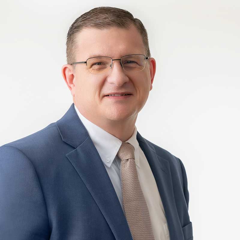 Man in suit with neutral background