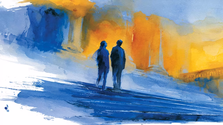 two silhouetted figures walking through glowing misty street at dusk